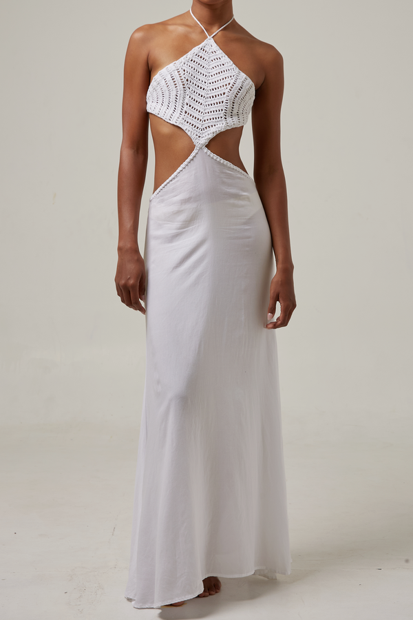 akoiaswim White dress with cut-out design on a plain background
