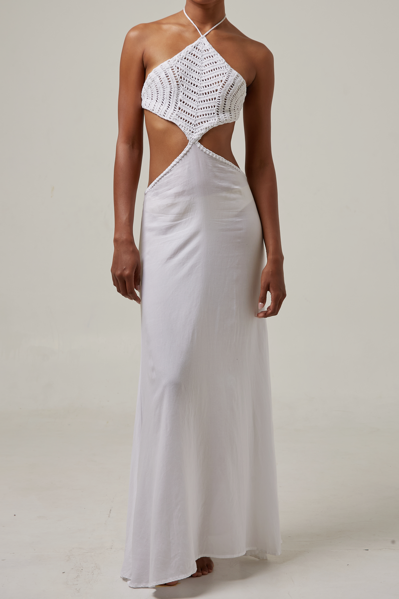 akoiaswim White dress with cut-out design on a plain background